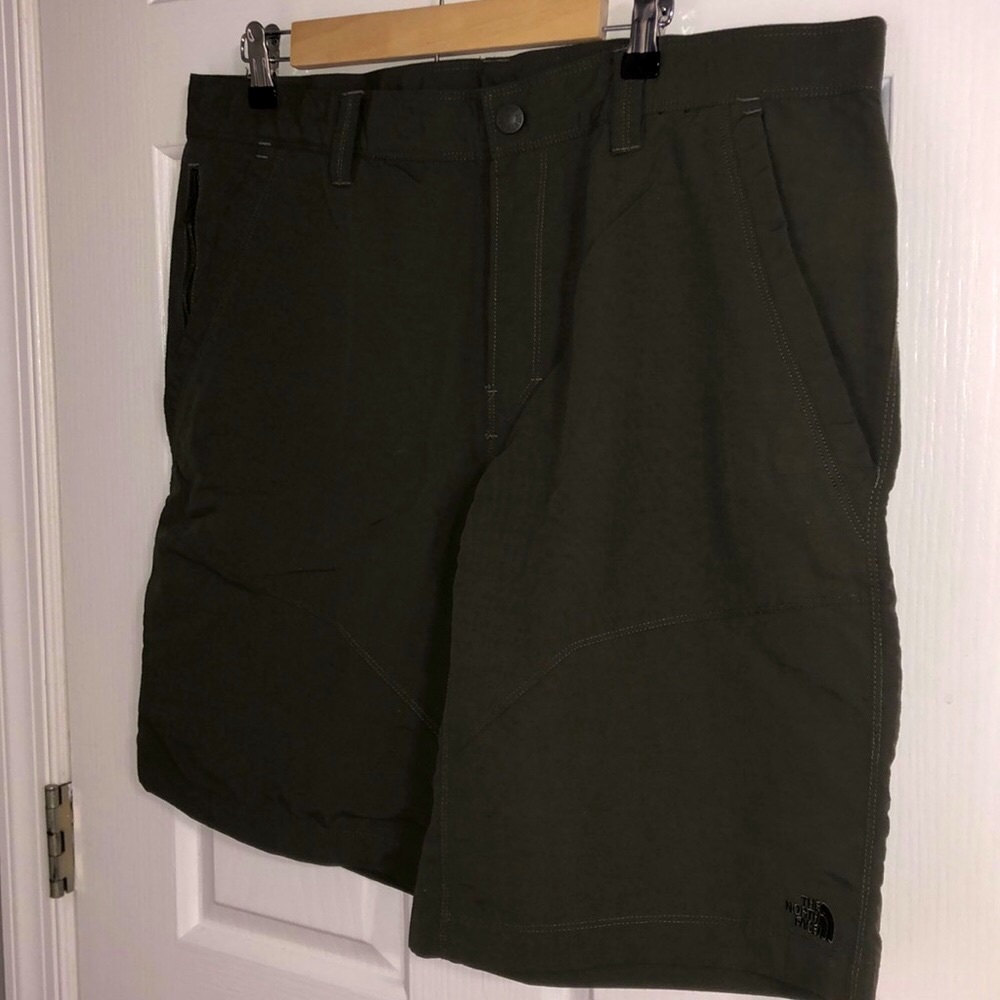 The North Face olive green mens cargo shorts 38 in waist. Like new!